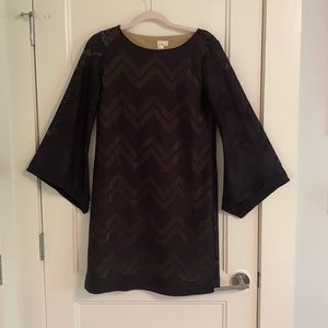 Black dress with chevron design.